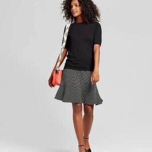 Who What Wear
Women's Jet Black short sleeve
Sweater Button detail  size XL NWT